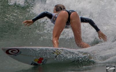 Get wet n wild with sexy surfer chicks. Photo #5